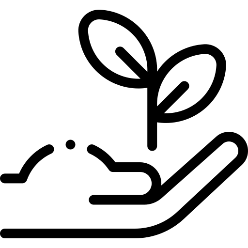 The image depicts a black cat with bright yellow eyes sitting on a black background.